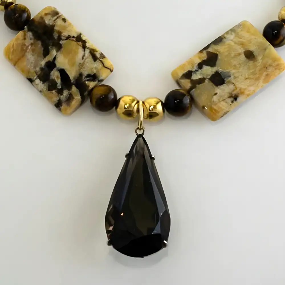 Closeup of a vintage 18-inch necklace features smooth square and 1" x 1.25" rectangular jasper stones