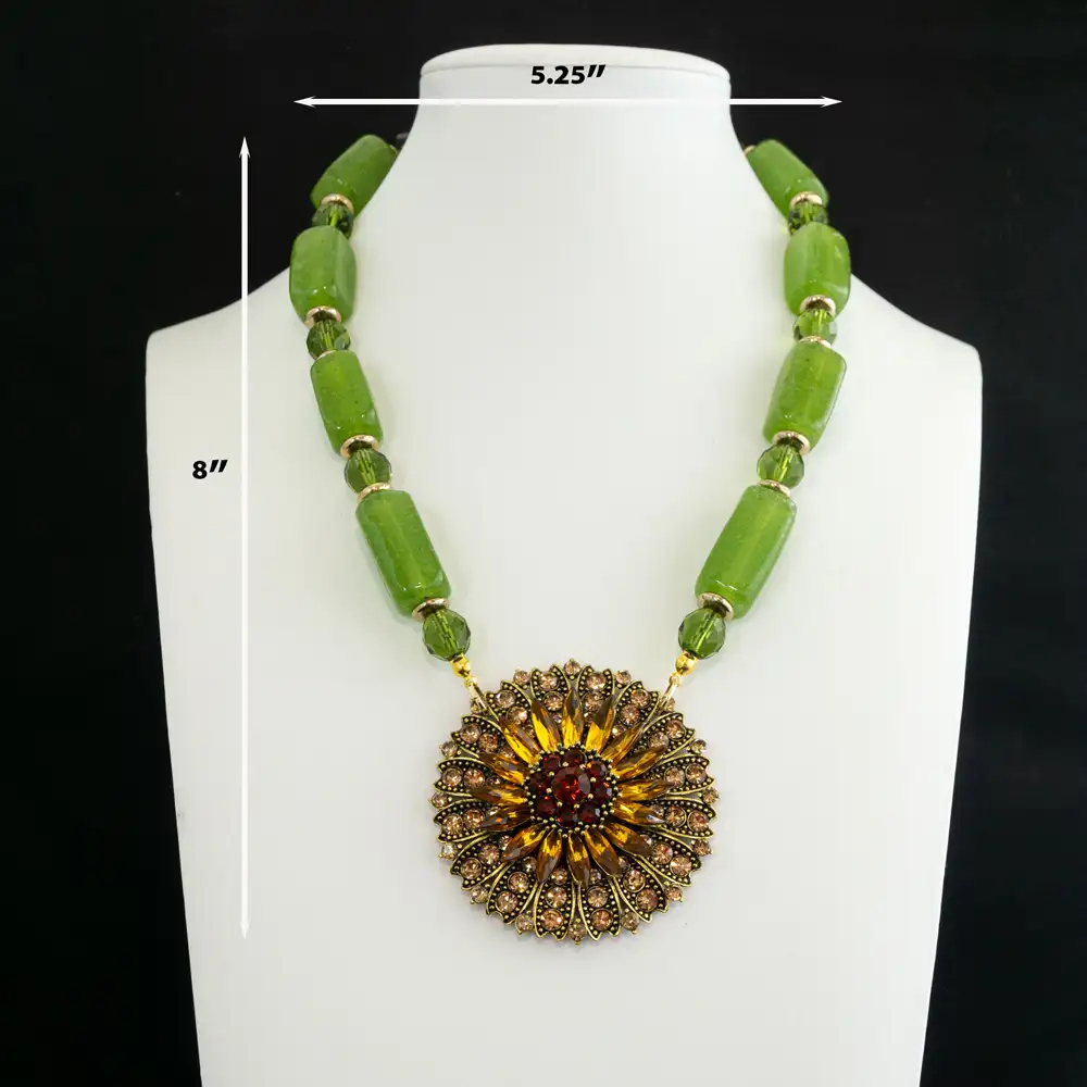 vintage necklace with a Large rectangular green glass stones pair seamlessly with 9mm faceted green glass beads, separated by warm gold-tone spacers for dynamic texture.