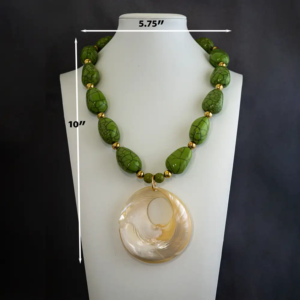 Dimensions of a vintage 20-inch necklace features a bold band of large, eye-catching apple green howlite stones.