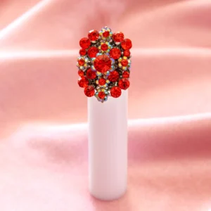 this statement cocktail ring showcases vibrant flame-orange rhinestones